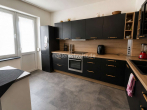 Küche - STILVOLL INVESTIEREN – 3-ZIMMER MIT BALKON UND BLICK AUF DEN WASSERTURM