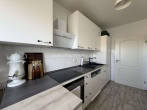Küche Ansicht 2 - GEPFLEGTE 3-ZIMMER-EIGENTUMSWOHNUNG MIT BALKON & GARAGE