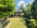 Rückansicht - PRAKTISCHES WOHNEN AUF EINER EBENE – BUNGALOW NEBST GARTEN & GARAGE!