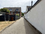 Zufahrt Garagen - EINE INVESTITION MIT BESTAND – MEHRFAMILIENHAUS MIT GARAGENHOF!