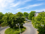 Aussicht Balkon - WOHNEN AUF DER BRUCKNERALLEE – LOGGIA, GARAGE & AUFZUG