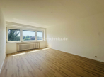 Wohnzimmer 2.OG - 8-PARTEIEN-MEHRFAMILIENHAUS MIT NEUEM VERMIETUNGSPOTENZIAL!