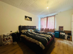 Schlafzimmer_EG - 8-PARTEIEN-MEHRFAMILIENHAUS MIT NEUEM VERMIETUNGSPOTENZIAL!