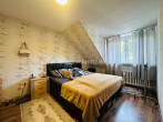 Schlafzimmer DG - 8-PARTEIEN-MEHRFAMILIENHAUS MIT NEUEM VERMIETUNGSPOTENZIAL!