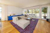 Wohnzimmeransicht - MODERNE PENTHOUSEWOHNUNG IM HERZEN DER STADT!