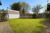 Garten - RUHIG GELEGENES EINFAMILIENHAUS MIT ZWEI GARAGEN UND GARTEN!
