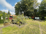 Garten - ATTRAKTIVES REIHENMITTELHAUS MIT WINTERGARTEN UND GARAGE